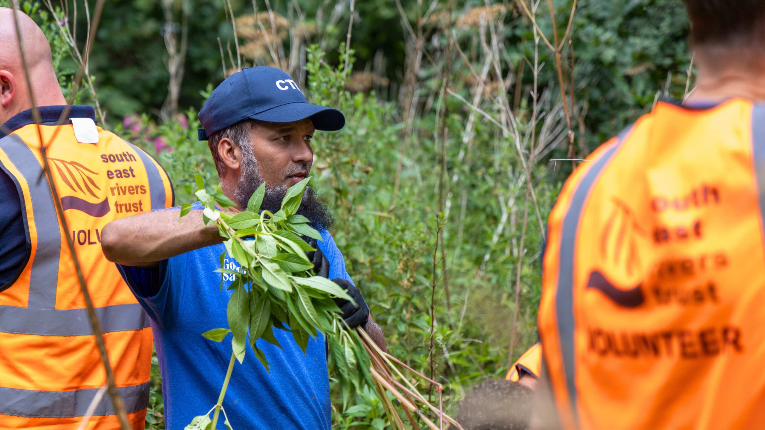 Volunteers help the South East Rivers Trust clear vegetation